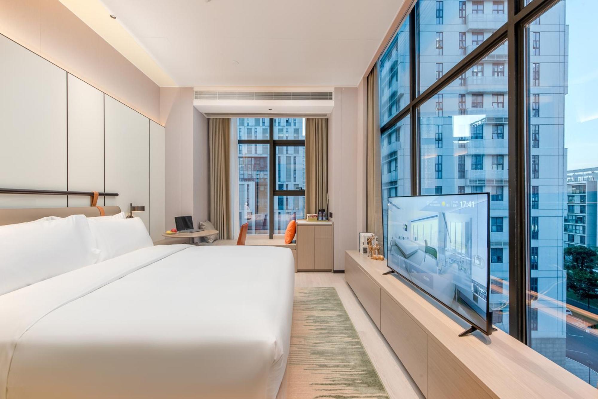 Oness Executive Hotel Guangzhou Huangpu Luogang - Free Shuttle Bus For Canton Fair Exterior photo